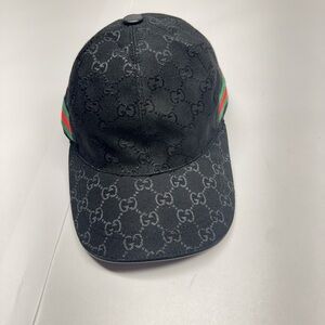 Like new women’s Gucci Black Cap with Signature Stripes GG monogram hat
